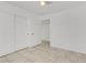 Bright bedroom with tile floors and mirrored closet doors at 1955 Cutlass Dr # 1955, Henderson, NV 89014