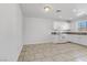 Bright kitchen featuring white cabinets and granite countertops at 1955 Cutlass Dr # 1955, Henderson, NV 89014