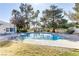 Inviting community pool with surrounding lounge chairs at 1955 Cutlass Dr # 1955, Henderson, NV 89014