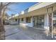 Covered patio with concrete flooring and wrought iron gate at 200 Rancho Vista Dr, Las Vegas, NV 89106