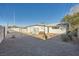 Large backyard with gravel and a block wall at 200 Rancho Vista Dr, Las Vegas, NV 89106