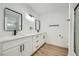 Elegant bathroom with dual vanity, quartz countertops, and modern lighting at 200 Rancho Vista Dr, Las Vegas, NV 89106