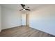 Bright bedroom with ceiling fan and light wood flooring at 200 Rancho Vista Dr, Las Vegas, NV 89106