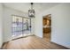 Dining room features hardwood floors and access to the backyard at 200 Rancho Vista Dr, Las Vegas, NV 89106