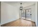 Bright dining room with sliding glass doors and wood floors at 200 Rancho Vista Dr, Las Vegas, NV 89106