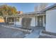 Quaint front porch with brick planters and an ornate door at 200 Rancho Vista Dr, Las Vegas, NV 89106