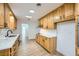 Modern kitchen with quartz countertops and stainless steel appliances at 200 Rancho Vista Dr, Las Vegas, NV 89106