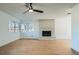 Living room with fireplace and light wood floors at 200 Rancho Vista Dr, Las Vegas, NV 89106