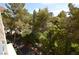 Community view showcasing lush landscaping and pool at 230 E Flamingo Rd # 334, Las Vegas, NV 89169