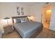 Bright bedroom with king-size bed and access to bathroom at 230 E Flamingo Rd # 334, Las Vegas, NV 89169