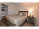 Bedroom with wooden bed frame and ample closet space at 230 E Flamingo Rd # 334, Las Vegas, NV 89169