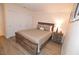 Bedroom with wooden bed frame and ample closet space at 230 E Flamingo Rd # 334, Las Vegas, NV 89169