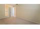 Bedroom featuring a glass block window and neutral wall colors at 2422 Paradise Village Way, Las Vegas, NV 89104