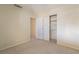 Bedroom with mirrored closet doors and carpeting at 2422 Paradise Village Way, Las Vegas, NV 89104