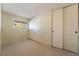 Bright bedroom with ample closet space and neutral carpeting at 2422 Paradise Village Way, Las Vegas, NV 89104