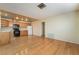 Bright kitchen with light wood cabinets, hardwood floors, and modern appliances at 2422 Paradise Village Way, Las Vegas, NV 89104