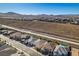 Aerial view of neighborhood showcasing homes with pools and landscaping at 2469 Cingoli St, Henderson, NV 89044