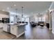 Modern kitchen island with granite countertops and stainless steel appliances at 2469 Cingoli St, Henderson, NV 89044