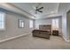 Large main bedroom with high ceilings, carpet, and a ceiling fan at 2469 Cingoli St, Henderson, NV 89044