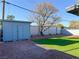 Backyard view showcasing artificial turf and a storage shed at 2820 Richfield Blvd, Las Vegas, NV 89102