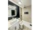 Modern bathroom with a walk-in shower and floating vanity at 2820 Richfield Blvd, Las Vegas, NV 89102