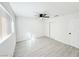 Bright bedroom with light gray vinyl flooring and a large closet at 2820 Richfield Blvd, Las Vegas, NV 89102