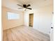 Bright bedroom with light gray vinyl flooring and a large closet at 2820 Richfield Blvd, Las Vegas, NV 89102