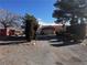 Gravel driveway leading to a carport and house at 2891 Oakleaf Ave, Pahrump, NV 89048