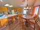 Kitchen with an island, granite countertops, and wooden cabinets at 2891 Oakleaf Ave, Pahrump, NV 89048