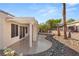 Backyard with pergola-covered patio and desert landscaping at 3110 Scotts Valley Dr, Henderson, NV 89052