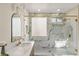 Luxury bathroom with marble shower and gold finishes at 3110 Scotts Valley Dr, Henderson, NV 89052