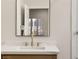 Chic bathroom vanity with a modern sink and gold fixtures at 3110 Scotts Valley Dr, Henderson, NV 89052