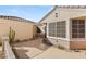 Home entrance with paved walkway and desert landscaping at 3110 Scotts Valley Dr, Henderson, NV 89052