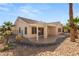 Single story home with pergola covered patio and desert landscaping at 3110 Scotts Valley Dr, Henderson, NV 89052