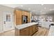 Kitchen island with marble countertop and built-in microwave at 3110 Scotts Valley Dr, Henderson, NV 89052