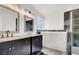 Bathroom with double vanity, walk-in shower, and soaking tub at 3434 Empress Diamond Dr, North Las Vegas, NV 89032