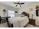 Bedroom with wood bed frame and ceiling fan at 3604 Lisandro St # 201, Las Vegas, NV 89108