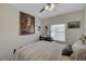 Bedroom with large window and ceiling fan at 3604 Lisandro St # 201, Las Vegas, NV 89108