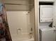 Bathroom with shower/tub and stackable washer/dryer at 4241 Gannet Cir # 205, Las Vegas, NV 89103