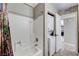 Bathroom features a tub/shower combination and a stacked washer/dryer unit at 4241 Gannet Cir # 205, Las Vegas, NV 89103