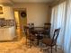 Small dining area with a round table and four chairs at 4241 Gannet Cir # 205, Las Vegas, NV 89103