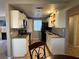 Well-equipped kitchen with granite countertops and white cabinets at 4241 Gannet Cir # 205, Las Vegas, NV 89103