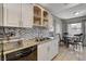 Kitchen area with stainless steel appliances and an adjacent dining area at 4241 Gannet Cir # 205, Las Vegas, NV 89103