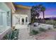 Outdoor kitchen and patio area with built-in grill and seating at 4541 Largo Cantata St, Las Vegas, NV 89135