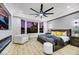 Main bedroom with city view, fireplace, and large windows at 4541 Largo Cantata St, Las Vegas, NV 89135