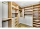 Large walk-in closet with ample shelving and hanging space at 4541 Largo Cantata St, Las Vegas, NV 89135