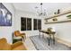 Home office with floating shelves and a rustic desk at 4541 Largo Cantata St, Las Vegas, NV 89135