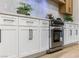 White shaker cabinets and stainless steel range at 4541 Largo Cantata St, Las Vegas, NV 89135