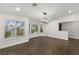 Bright dining room with large windows and modern chandelier at 4840 Conough Ln, Las Vegas, NV 89149