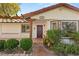 Inviting entryway with a wood door and terracotta tile at 4840 Conough Ln, Las Vegas, NV 89149